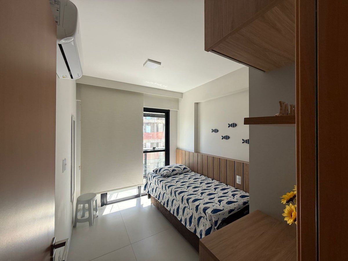 Quarto com duas camas de solteiro